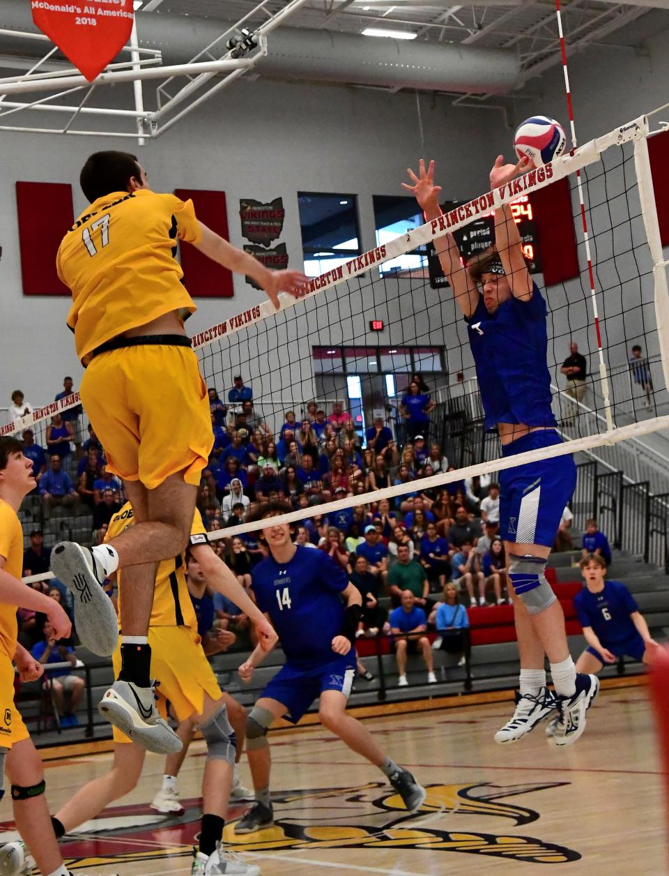 Tyler Geselbracht (17) scores on a spike for Moeller at the OHSBVA South Region championships, May 28, 2022.