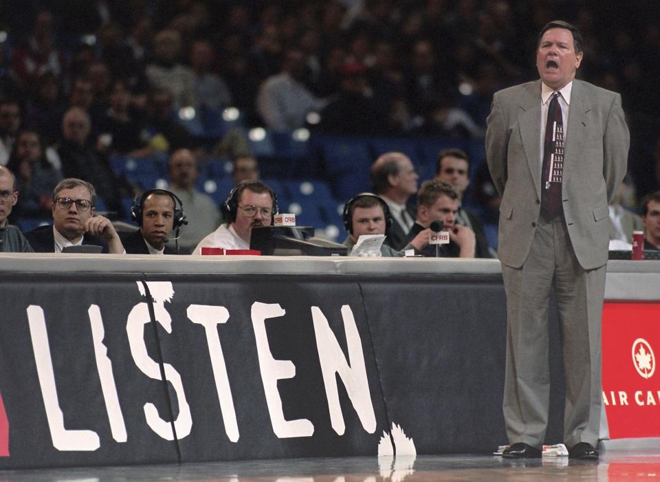 FILE - Toronto Raptors head coach Brendan Malone during first quarter NBA basketball action against the Atlanta Hawks in Toronto, Thursday Jan. 11, 1996. Malone, father of Denver Nuggets coach Michael Malone and a driving force behind the Detroit Pistons “Bad Boy” defenses in the late 1980s and early '90s, has died, the Nuggets announced Tuesday, Oct. 10, 2023. He was 81. (Frank Gunn/Canadian Press via AP, File)