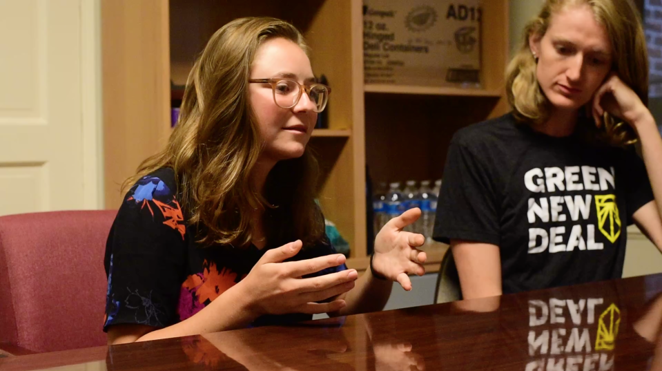 Revelle Mast, left, and Lauren Maunus of Sunrise Movement, a youth-led movement advocating political action on climate change.