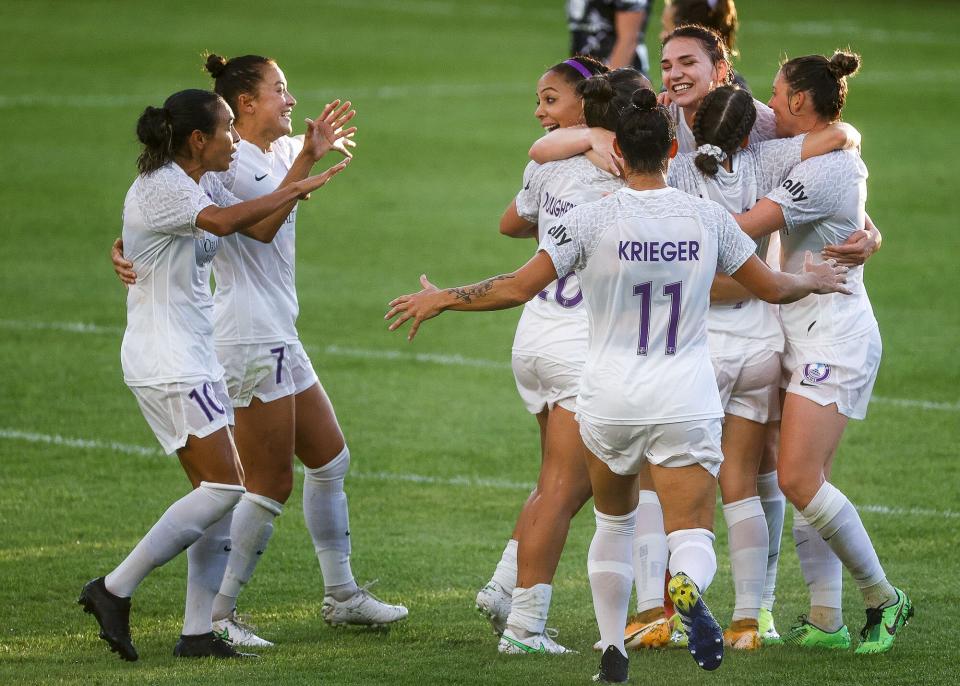 The Orlando Pride celebrate a goal by Taylor Kornieck #22 during the first half against Racing Louisville FC at Lynn Family Stadium on April 10, 2021 in Louisville, Kentucky.