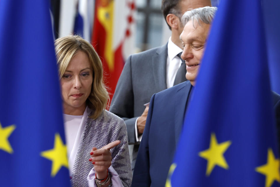 Hungary's Prime Minister Viktor Orban, right, speaks with Italy's Prime Minister Giorgia Meloni prior to a group photo at an EU summit in Brussels, Thursday, June 27, 2024. European Union leaders are expected on Thursday to discuss the next EU top jobs, as well as the situation in the Middle East and Ukraine, security and defence and EU competitiveness. (AP Photo/Geert Vanden Wijngaert)