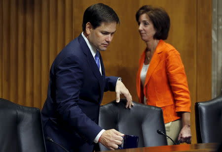 U.S. Senator and Republican presidential candidate Marco Rubio (R-FL) takes his seat as he prepares to question Assistant Secretary of State for Western Hemisphere Affairs Roberta Jacobson (R) about U.S.-Cuba relations during a hearing of the Senate Foreign Relations Committee on Capitol Hill in Washington May 20, 2015. REUTERS/Jim Bourg