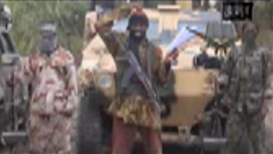 FILE - In this file image made from video received by The Associated Press on Monday, May 5, 2014, Abubakar Shekau, the leader of Nigeria's Islamic extremist group Boko Haram, speaks in a video in which his group claimed responsibility for the April 15 mass abduction of nearly 300 teenage schoolgirls in northeast Nigeria. Even before the kidnapping, the U.S. government was offering up to a $7 million reward for information leading to the arrest of Shekau, whom the U.S. has labeled a specially designated global terrorist. (AP Photo/File)