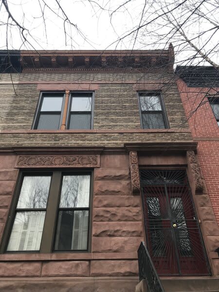 Before: Michelle Young and Augustin Pasquet bought this townhouse in the Crown Heights neighborhood of Brooklyn with the goal to modernize it without losing key historical features, like the main floor layout and decorative woodwork in the entry.