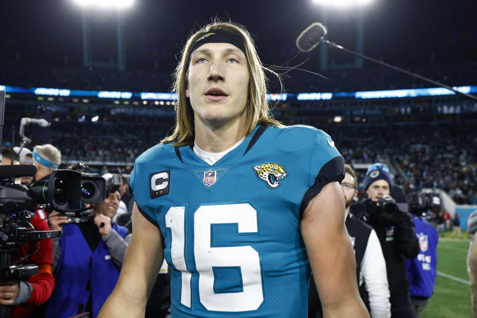 JACKSONVILLE, FLORIDA - JANUARY 14: Trevor Lawrence #16 of the Jacksonville Jaguars celebrates on the field after defeating the Los Angeles Chargers 31-30 in the AFC Wild Card playoff game at TIAA Bank Field on January 14, 2023 in Jacksonville, Florida. (Photo by Douglas P. DeFelice/Getty Images)