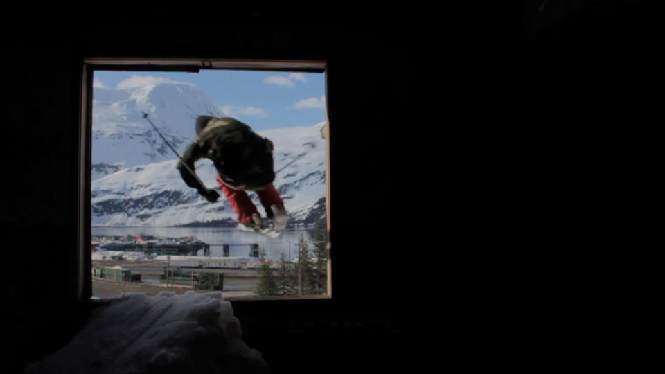 PIC FROM CATERS NEWS - (PICTURED; Logan Imlach jumping out of the building) Most people prefer to ski on big snowy slopes, but as this jaw dropping video shows, Logan Imlach is no ordinary Skiier. Shot in Alaska by native Matt Wild, the two minute clip shows Logan skiing through a five floor tower block navigating the winding staircases and even jumping out of windows. Both Matt and Logan work in an oil field, where they work the same three week shift. SEE CATERS COPY.