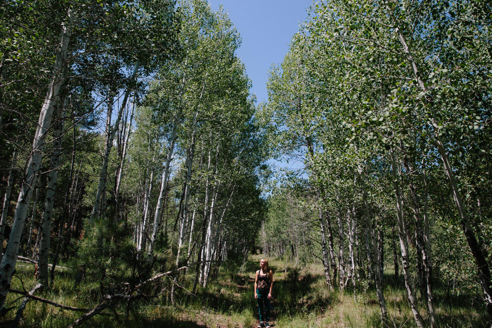 Laura Quinn in the woods of the Coconino National Forest outside Flagstaff, Arizona. (Photo: Caitlin O'Hara for HuffPost)