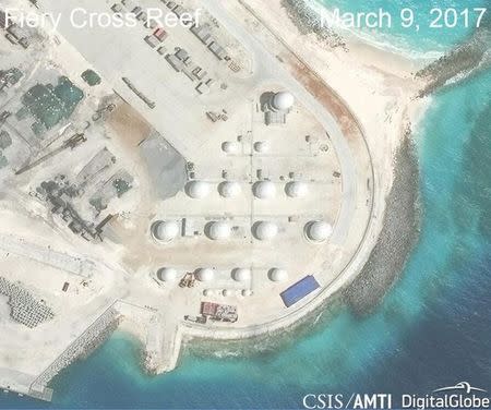Construction is shown on Fiery Cross Reef, in the Spratly Islands, the disputed South China Sea in this March 9, 2017 satellite image released by CSIS Asia Maritime Transparency Initiative at the Center for Strategic and International Studies (CSIS) to Reuters on March 27, 2017. MANDATORY CREDIT: CSIS/AMTI DigitalGlobe/Handout via REUTERS