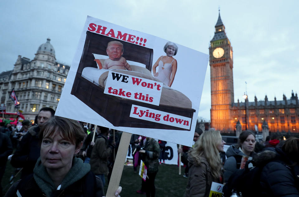 <p>A demonstrator holds a placard during a protest against U.S. President Donald Trump in London, Feb. 20, 2017. (Photo: Gareth Fuller/PA Images via Getty Images) </p>