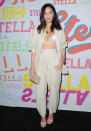 <p>Olivia Munn donned a velvet bralette and co-ordinating suit for the fashion event. <em>[Photo: Getty]</em> </p>