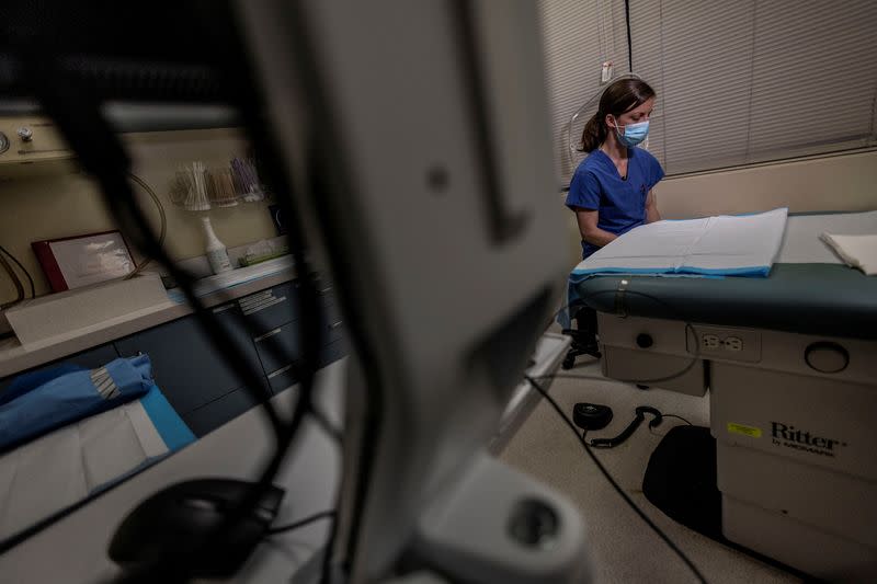 FILE PHOTO: A doctor is seen inside a consultation room at the Planned Parenthood Health Center in Sacramento, California