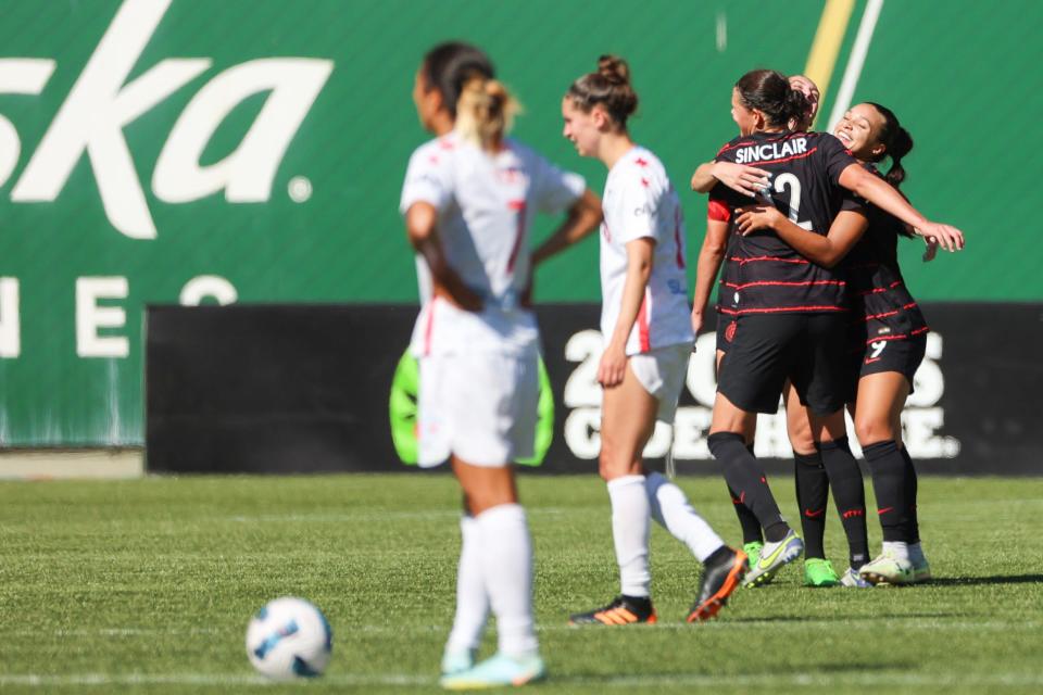 The Chicago Red Stars react to a goal from the Portland Thorns.