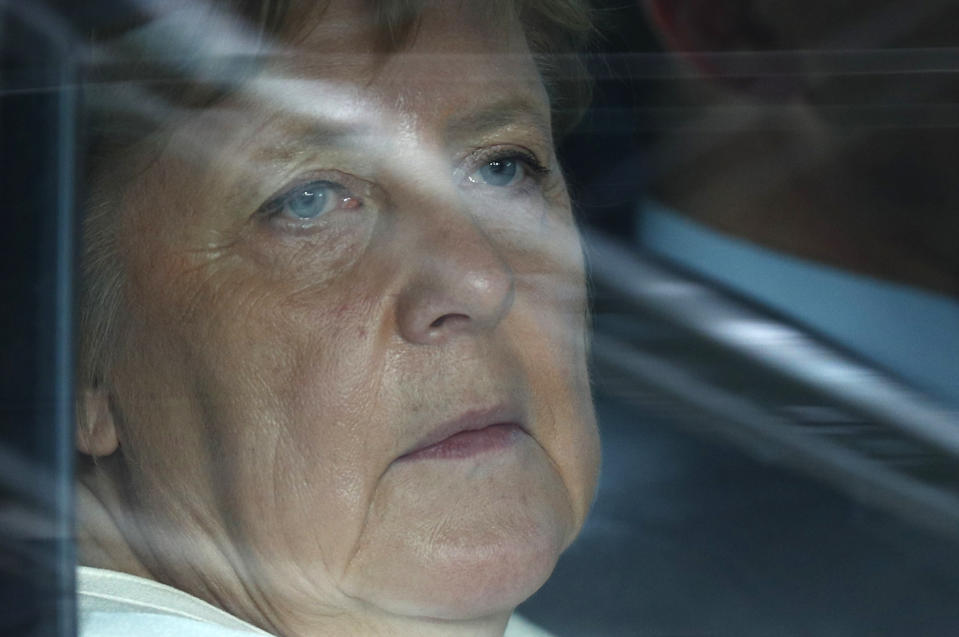 German Chancellor Angela Merkel arrives for an EU summit in Brussels, Sunday, June 30, 2019. European Union leaders have started another marathon session of talks desperately seeking a breakthrough in a diplomatic fight over who should be picked for a half dozen of jobs at the top of EU institutions. (Francois Lenoir, Pool Photo via AP)