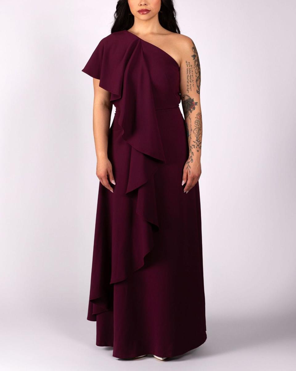 <p><a href="https://lesleyhampton.com/products/asymmetric-ruffle-gown" rel="nofollow noopener" target="_blank" data-ylk="slk:Shop Now;elm:context_link;itc:0;sec:content-canvas" class="link ">Shop Now</a></p><p>Asymmetric Drape Gown</p><p>lesleyhampton.com</p><p>$348.00</p>