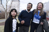 Nicaraguan opposition leader Felix Maradiaga is reunited with his wife Berta Valle and daughter Alejandra, in Chantilly, Va., Thursday, Feb. 9, 2023. Maradiaga was among some 222 prisoners of the government of Nicaraguan President Daniel Ortega who arrived from Nicaragua to the Washington Dulles International Airport on Thursday, after an apparently negotiated release. (AP Photo/Jose Luis Magana)