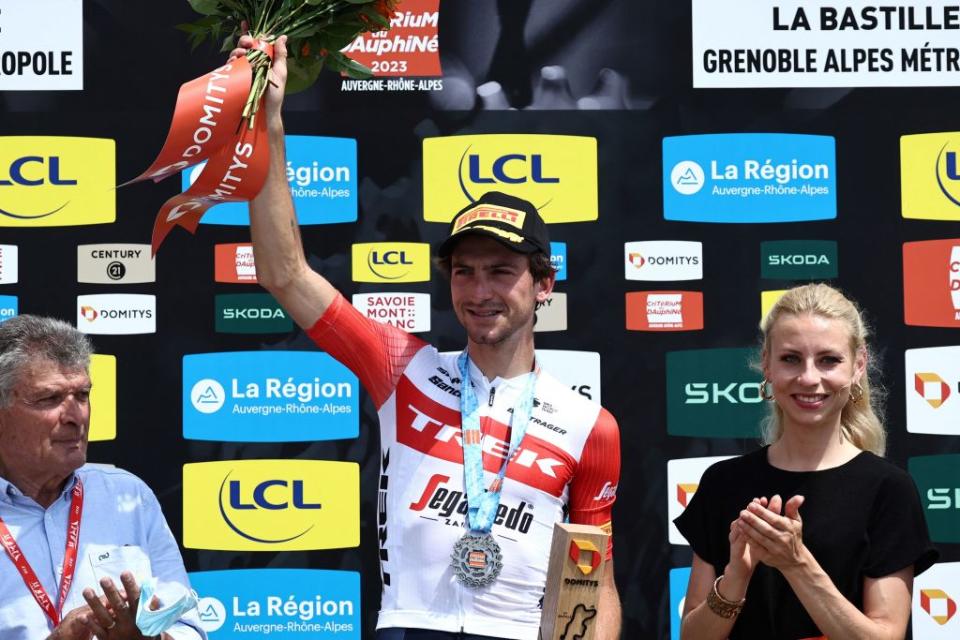 Trek  Segafredo’s Giulio Ciccone celebrates on the podium after winning the eighth stage of the 75th edition of the Criterium du Dauphine