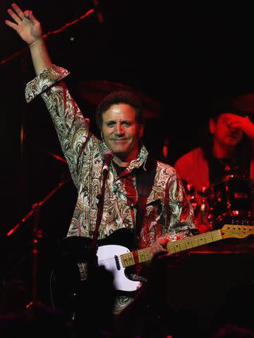 <p>Robert Cianflone/Getty</p> Frank Stallone performs on stage in concert at The Forum Theatre in 2010