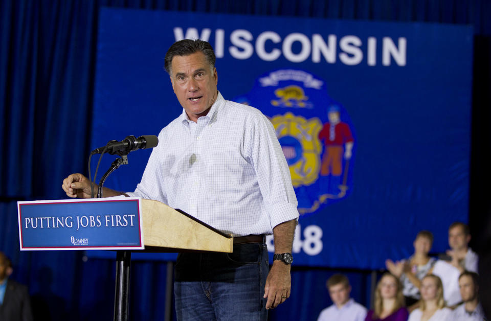 Republican presidential candidate, former Massachusetts Gov. Mitt Romney gestures during a campaign stop at Monterey Mills on Monday, June 18, 2012 in Janesville, Wis. (AP Photo/Evan Vucci)