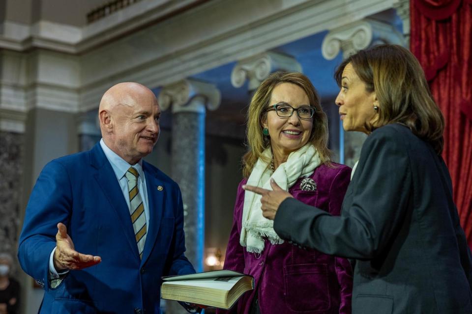 PHOTO: In this Jan. 3, 2023 file photo, Vice President Kamala Harris prepares to swear in Sen. Mark Kelly, D-Ariz., with his wife Gabrielle Giffords in the old senate chamber for the Ceremonial Swearing in Washington. (Tasos Katopodis/Getty Images, FILE)