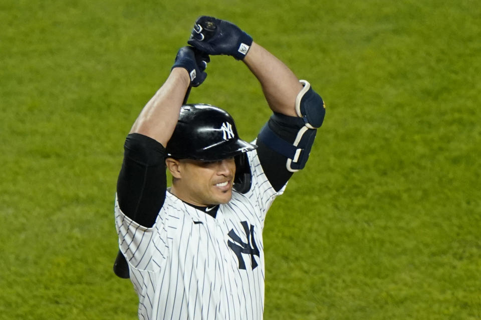 CORRECTS THAT THIS WAS AFTER STANTON FLEW OUT IN THE SIXTH, INSTEAD OF STRIKING OUT IN THE EIGHTH - New York Yankees' Giancarlo Stanton reacts after flying out during the sixth inning of the team's baseball game against the Atlanta Braves, Wednesday, April 21, 2021, at Yankee Stadium in New York. (AP Photo/Kathy Willens)