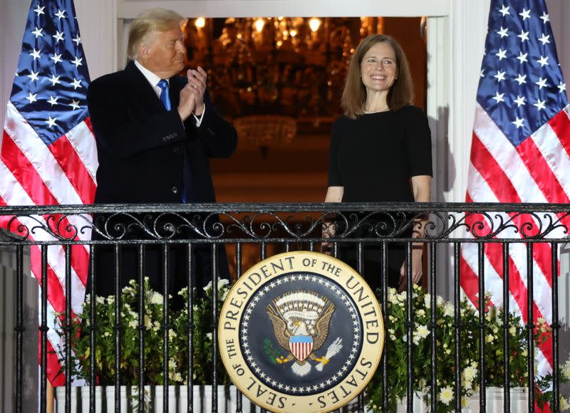Judge Amy Coney is sworn in as an associate justice of the U.S. Supreme Court at the White House in Washington