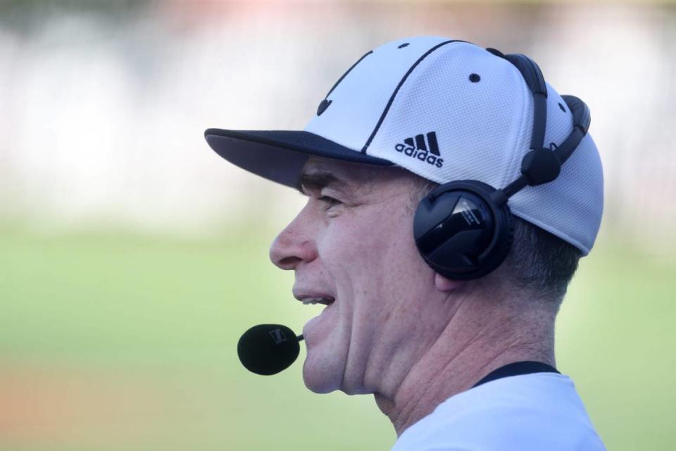 Louisville’s coach Dan McDonnell talks to the broadcast in the game against Vanderbilt.May 9, 2023