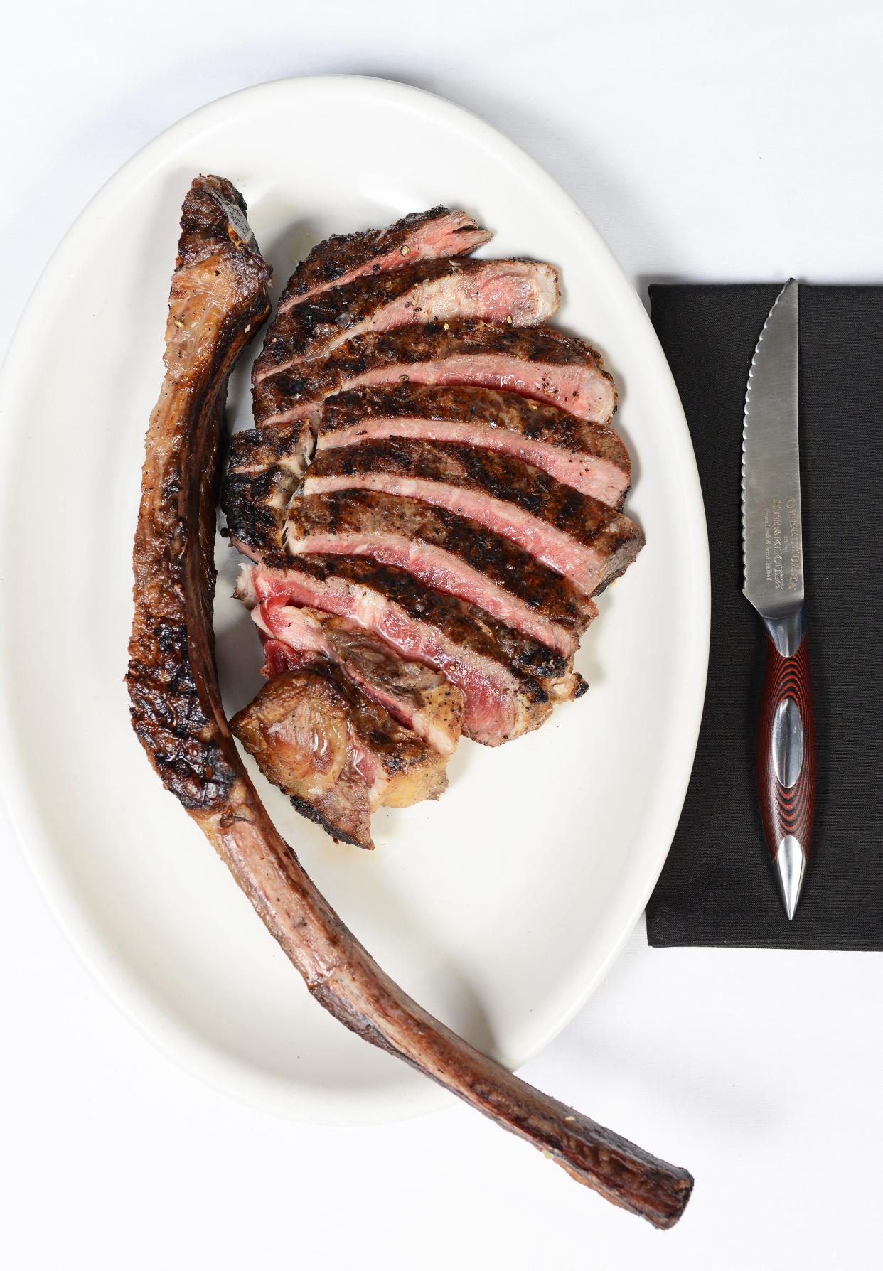 Find true love via your sweetheart, dry-aged tomahawk ribeye or both at Okeechobee Steakhouse in West Palm Beach.