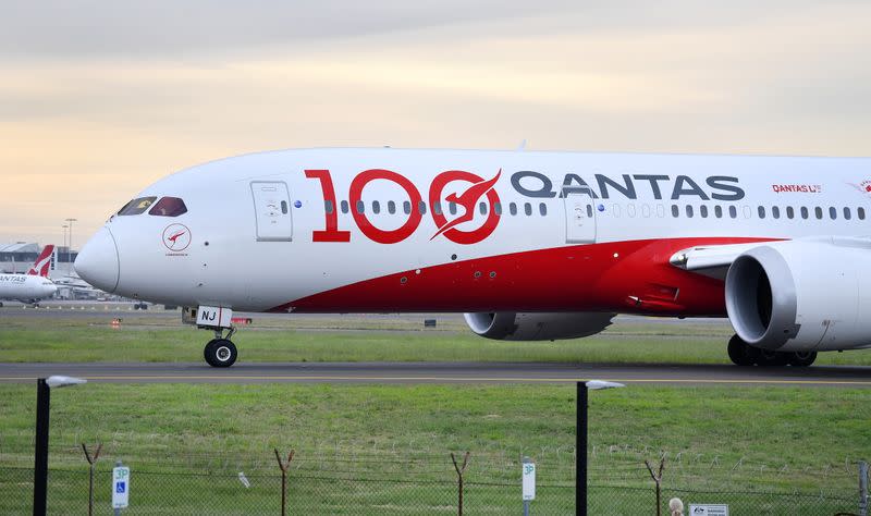 Qantas Airways QF100 flight, which marks the airline's 100th birthday, is seen at Sydney Airport before flying over Sydney Harbour in Australia