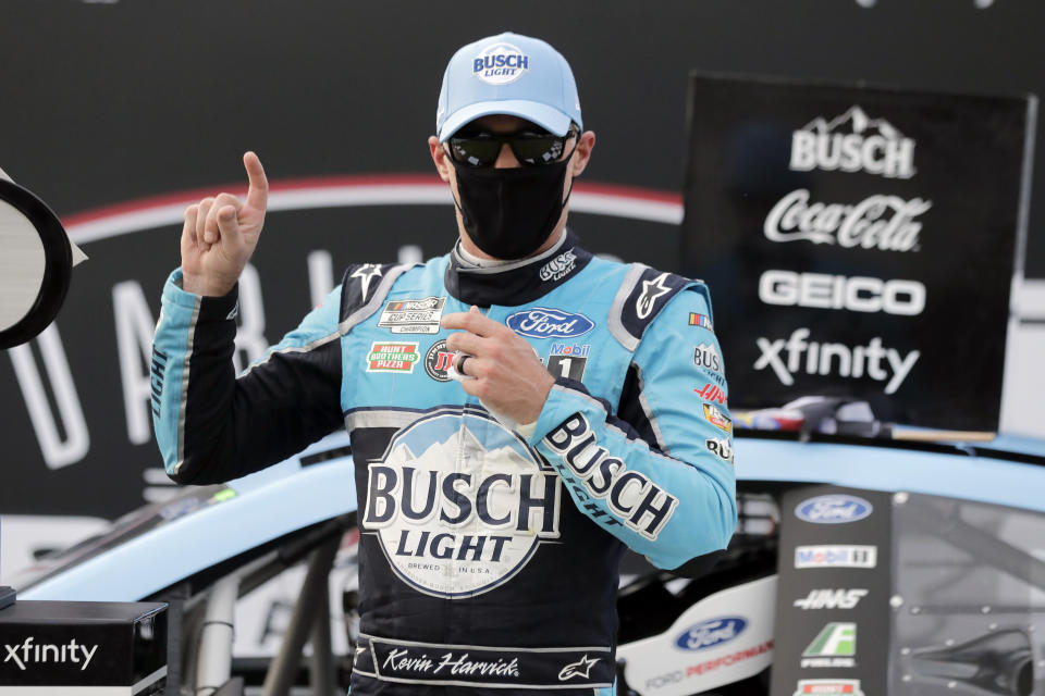 Kevin Harvick celebrates after winning the NASCAR Cup Series auto race Sunday, May 17, 2020, in Darlington, S.C. (AP Photo/Brynn Anderson)