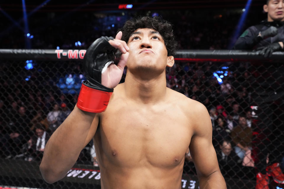 LAS VEGAS, NEVADA - DECEMBER 10: Raul Rosas Jr. reacts after defeating Jay Perrin in a featherweight fight during the UFC 282 event at T-Mobile Arena on December 10, 2022 in Las Vegas, Nevada. (Photo by Chris Unger/Zuffa LLC)