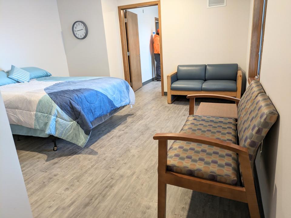 Model of main bedroom and living space in a family unit at the Bishop Dudley Center for Families.