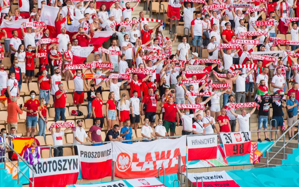 Poland fans urge their team on - GETTY IMAGES