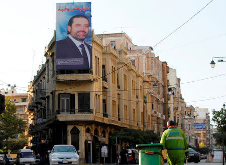 A poster depicting Lebanon's Prime Minister Saad al-Hariri, who has resigned from his post, hangs on a building in Tripoli, northern Lebanon, November 7, 2017. REUTERS/Omar Ibrahim