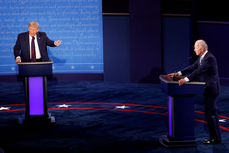 U.S. President Donald Trump and Democratic presidential nominee Joe Biden participate in their first 2020 presidential campaign debate in Cleveland