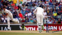 Cricket - Australia v England - Ashes test match - WACA Ground, Perth, Australia, December 17, 2017 - Australia's Mitchell Starc celebrates after bowling England's James Vince during the fourth day of the third Ashes cricket test match. REUTERS/David Gray