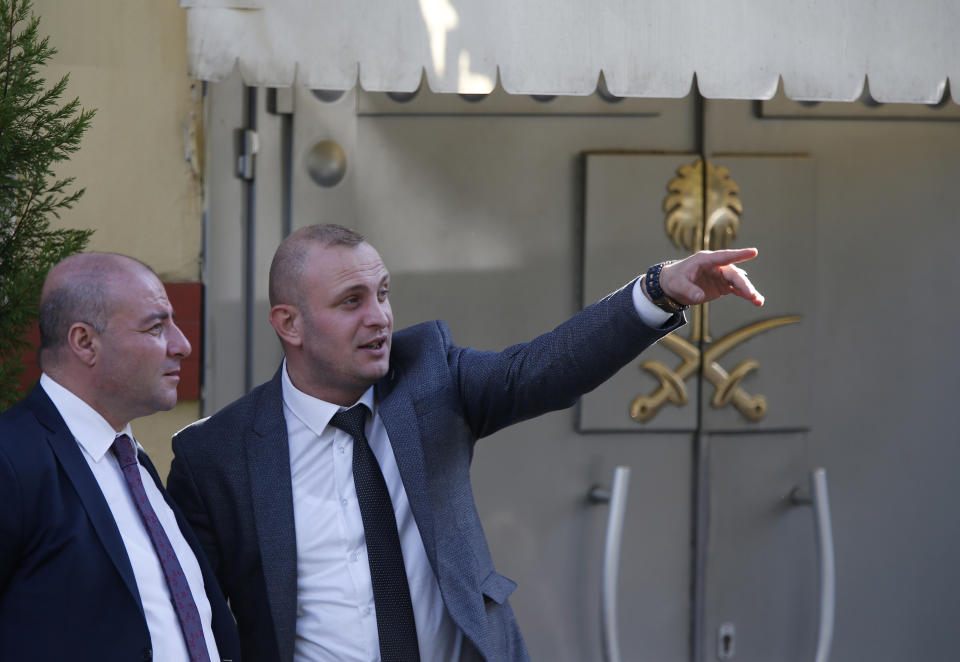 Members of security stand outside the Saudi Arabia consulate in Istanbul, Monday, Oct. 8, 2018. Turkey has summoned the Saudi ambassador to request the kingdom's "full cooperation" in an investigation into the disappearance of journalist Jamal Khashoggi, who Turkish officials say was killed while visiting the Saudi Consulate in Istanbul. (AP Photo/Lefteris Pitarakis)