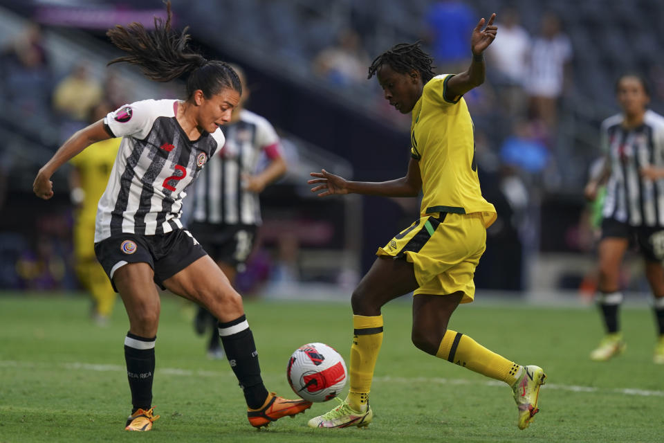 Costa Rica's Gabriela Guillen and Jamaica's Jody Brown fight for the ball during the CONCACAF Women's Championship soccer match for third place, in Monterrey, Mexico, Monday, July 18, 2022. (AP Photo/Fernando Llano)