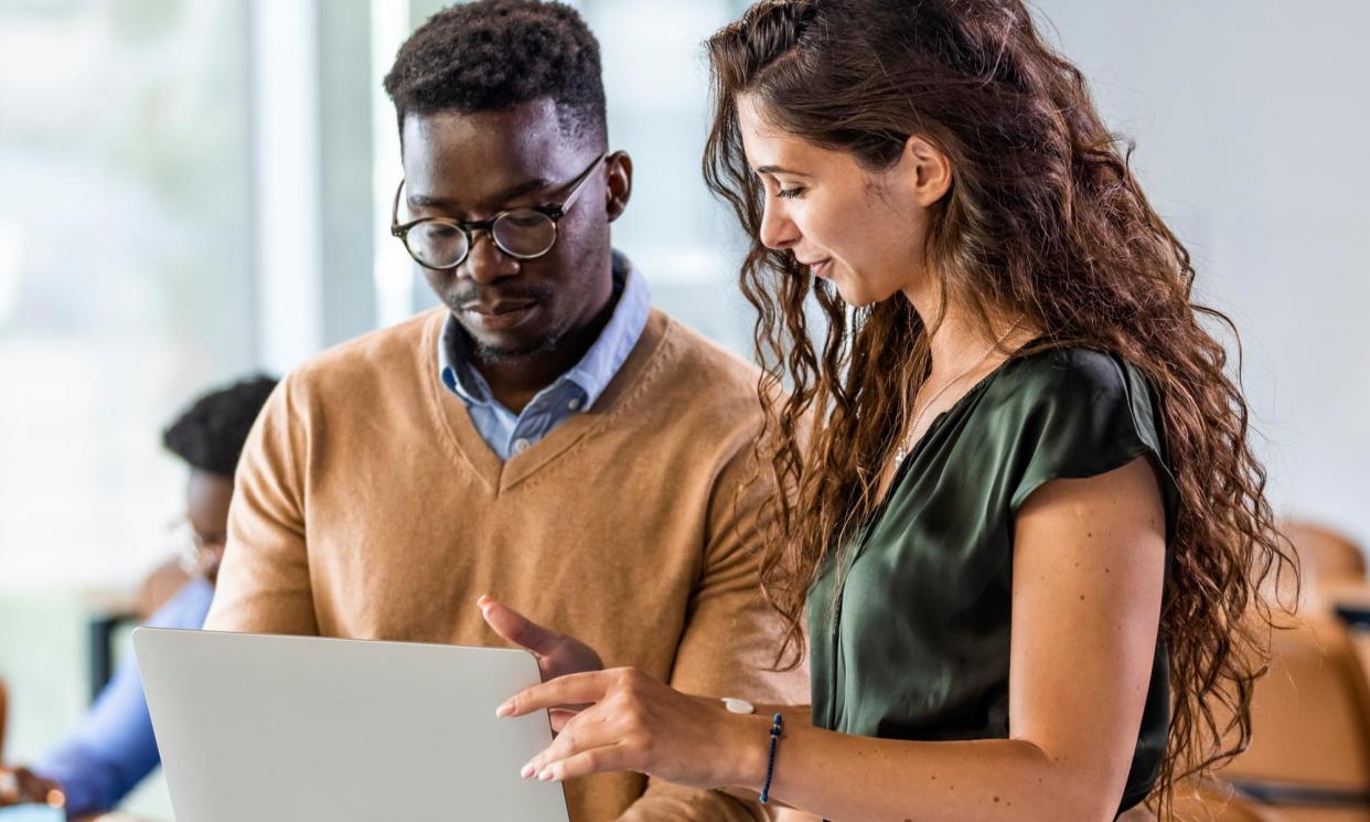 <span>Degree apprentices spend roughly 80% of their time at work, 20% studying.</span><span>Photograph: ljubaphoto/Getty Images</span>