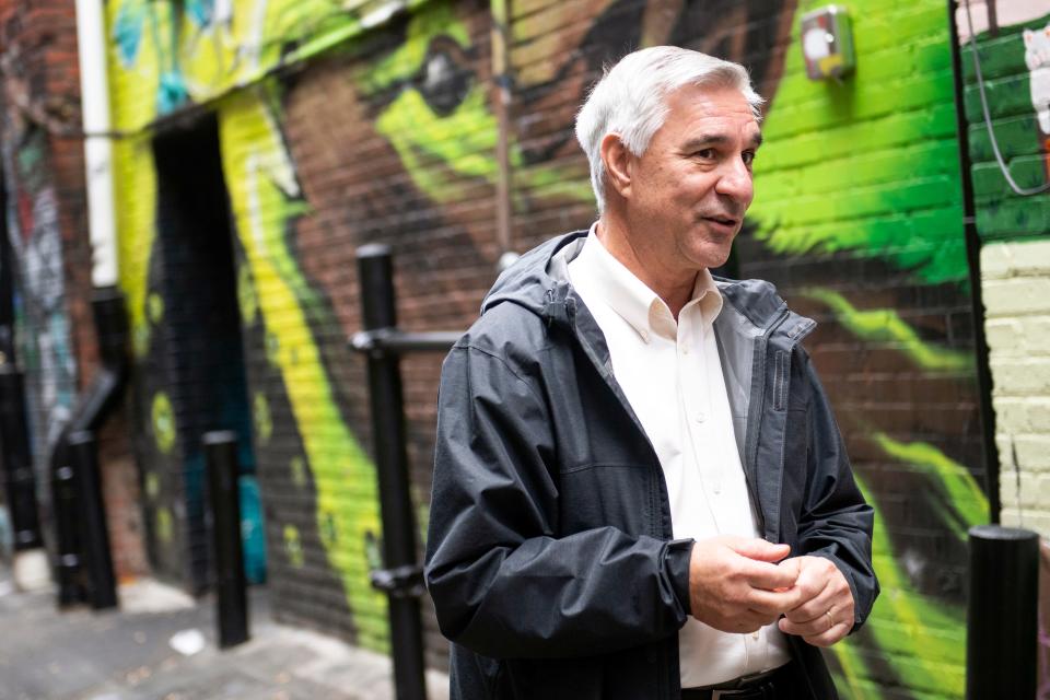 Rick Emmett, downtown coordinator for the city of Knoxville, speaks with Knox News at downtown Knoxville's Strong Alley on Oct. 28, 2021. Emmett, who has worked for the city under five mayors for 31 years, is retiring at the end of March.