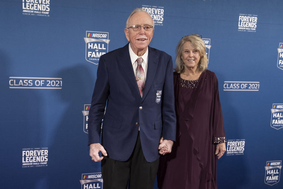 NASCAR Hall of Fame inductee Red Farmer, left, poses for photos prior to the induction ceremony Friday, Jan. 21, 2022, in Charlotte, N.C. (AP Photo/Matt Kelley)