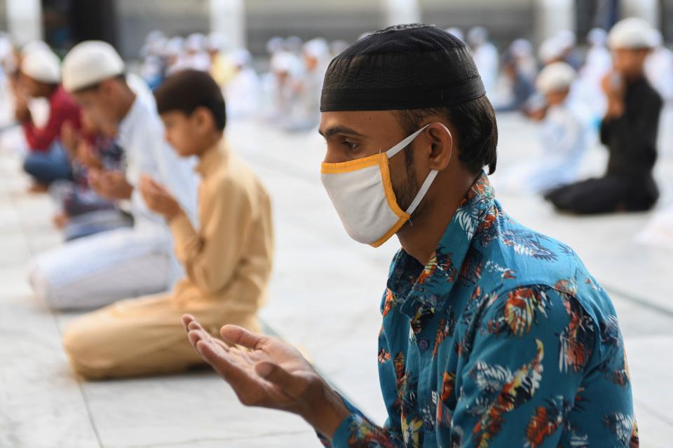 Muslim devotees offer a special prayer at the Jama Masjid Khairuddin to start the Eid-al-Fitr festival in Amritsar on May 25, 2020. (Photo by NARINDER NANU/AFP via Getty Images)