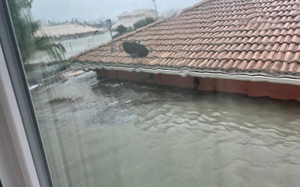 Storm surge on Fort Myers Beach sees water nearing roofs  - Twitter: @itsbethbooker