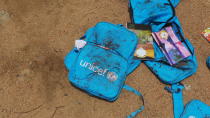 <p>Children’s backpacks are discarded a day after an airstrike in Saada, Yemen on Friday, Aug. 10, 2018. (Photo: Kareem al-Mrrany/AP) </p>