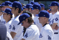 Los Angeles Dodgers pitchers Shohei Ohtani, left, celebrates Jackie Robinson Day alongside teammates before a baseball game against the Washington Nationals at Dodgers Stadium in Los Angeles on Monday, April 15, 2024. (AP Photo/Damian Dovarganes)