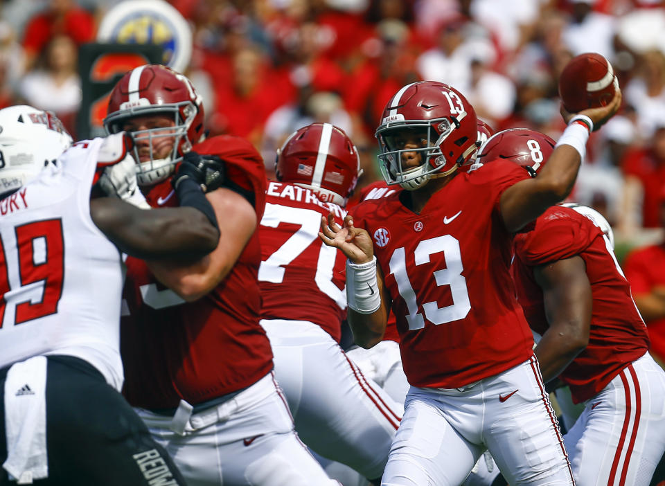 Alabama quarterback Tua Tagovailoa (13) throws a pass during the first half of an NCAA college football game against Arkansas State, Saturday, Sept. 8, 2018, in Tuscaloosa, Ala. (AP Photo/Butch Dill)