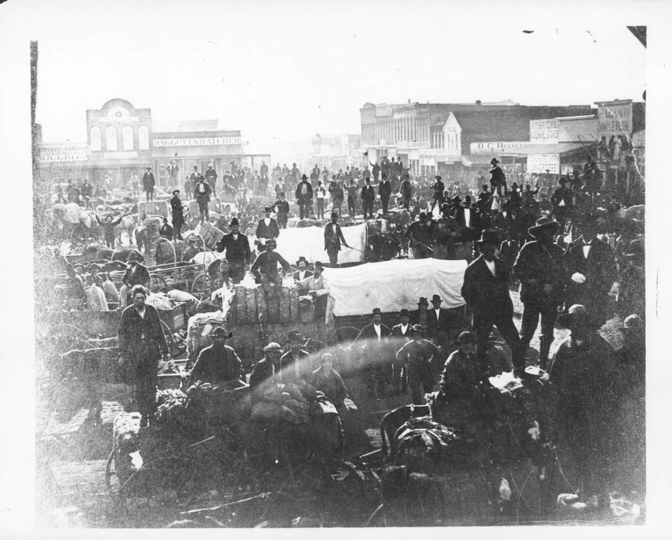 This is what Fort Worth looked like around 1878, when the last total eclipse of the sun occurred in Texas and people in town erupted in “continued shouts” during totality. This photo shows Houston Street on market day. Fort Worth Star-Telegram archive/UT Arlington Special Collections