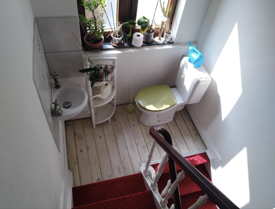a bathroom on a stairwell