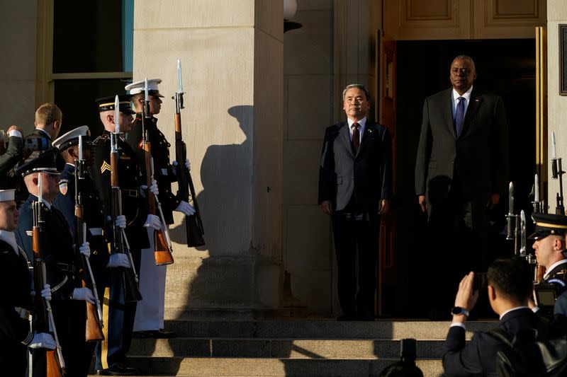 U.S. Defense Secretary Lloyd Austin greets South Korea's Defense Minister Jong-Sup Lee at the Pentagon in Washington