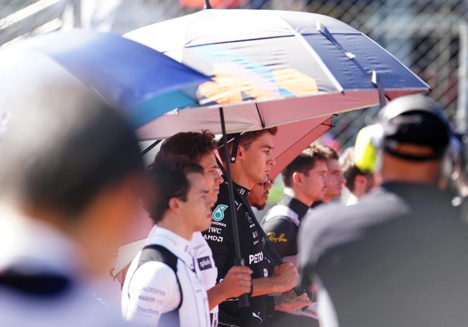 Mercedes driver George Russell (centre) observed a minute’s silence ahead of Sunday’s Italian Grand Prix (David Davies/PA) (PA Wire)