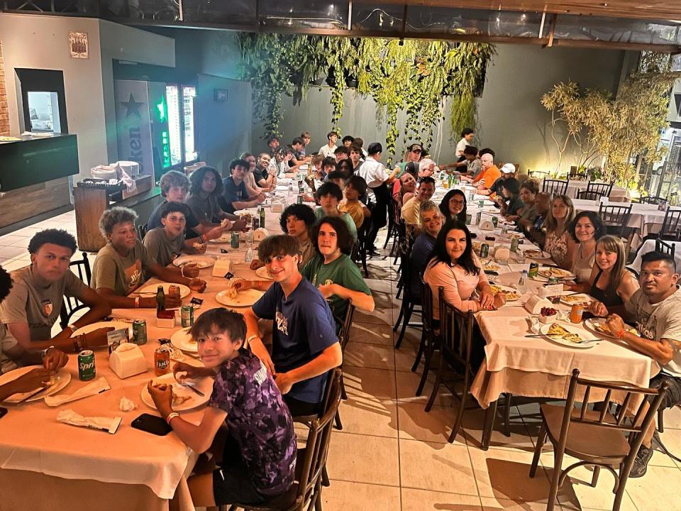 Booker T. Washington soccer players and family members enjoy an all-you-can-eat pizza restaurant in Brazil during "The Brazilian Soccer Experience" over Thanksgiving break.